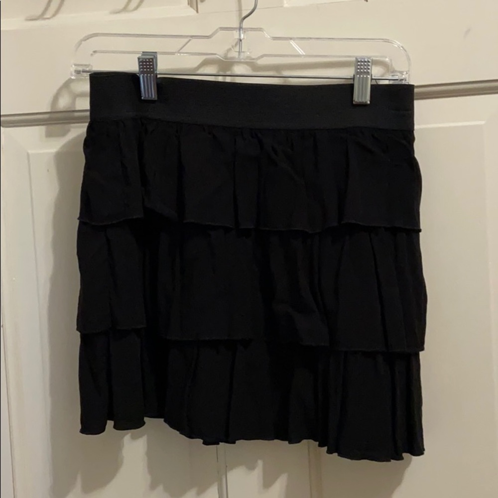 black ruffled skirt
